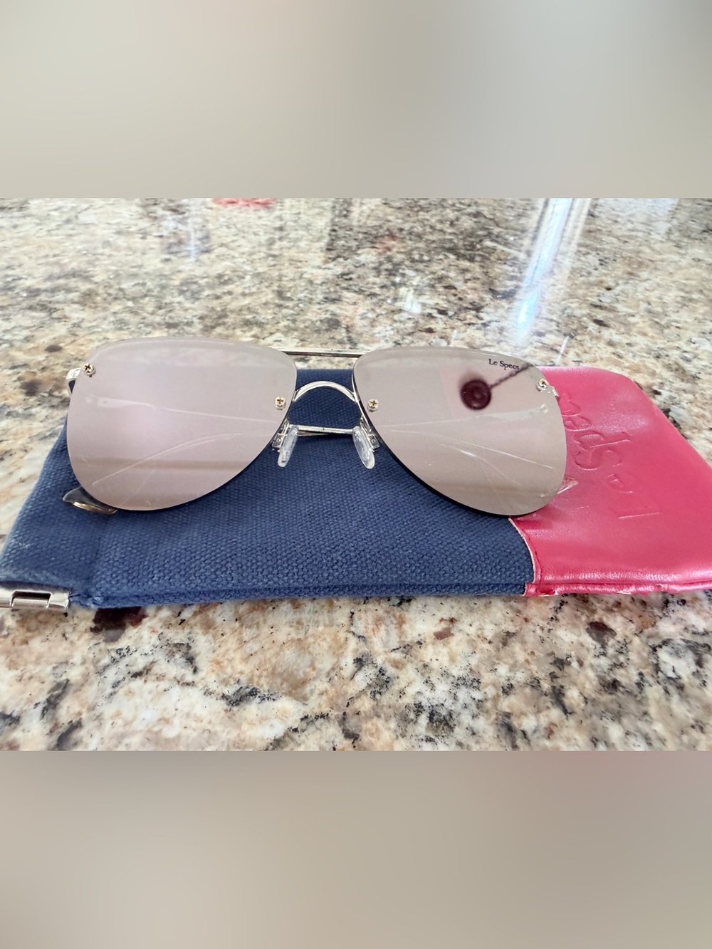 Le Specs Rimless Aviator Sunglasses with Pink Lenses